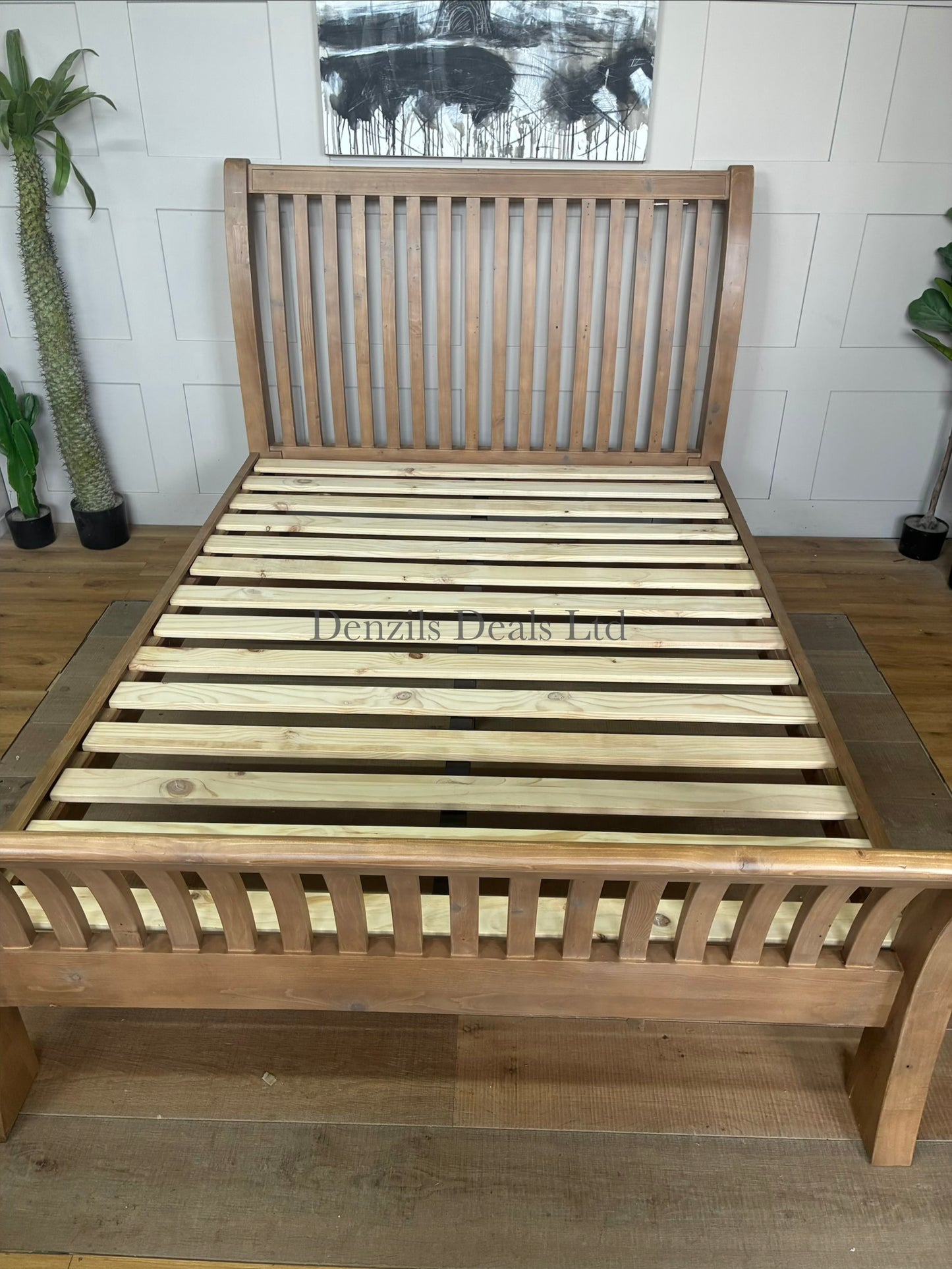 John Lewis Reclaimed Timber Bed Frame, King Size, Natural Wood featuring a charming, natural aesthetic thanks to its slatted design and shapely frame with a solid slats in the base that provide a supportive
