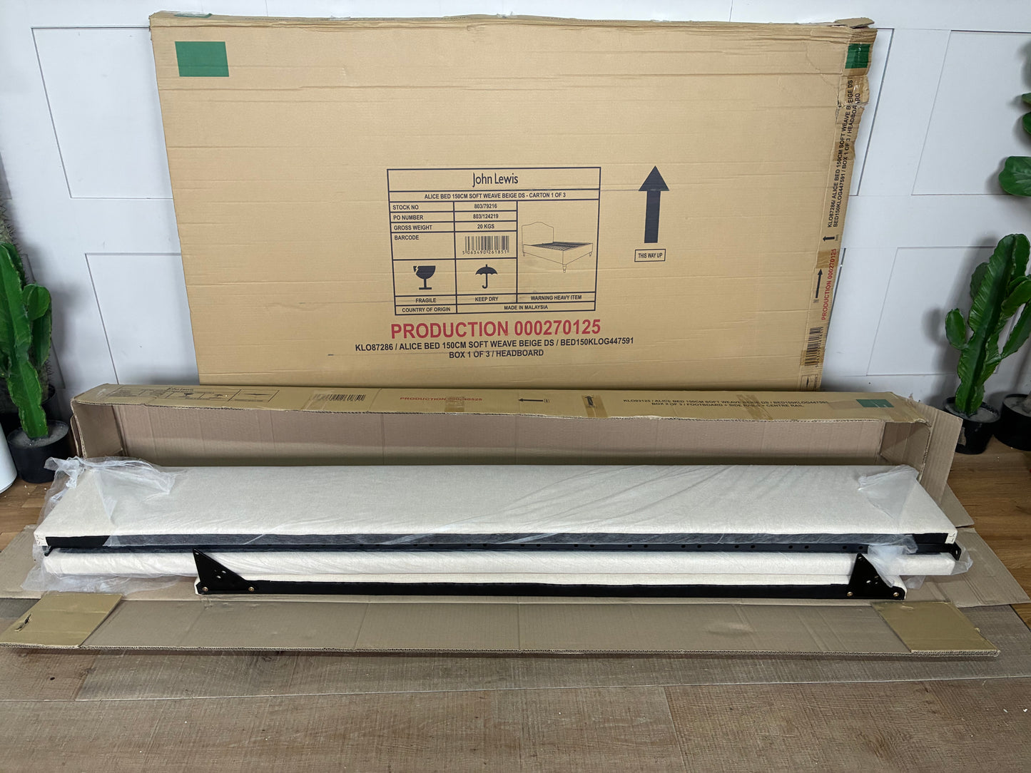 king-size John Lewis Alice Bed Frame, showcasing a beige fabric headboard with a gentle curve, vertical seaming, and light-colored wooden legs