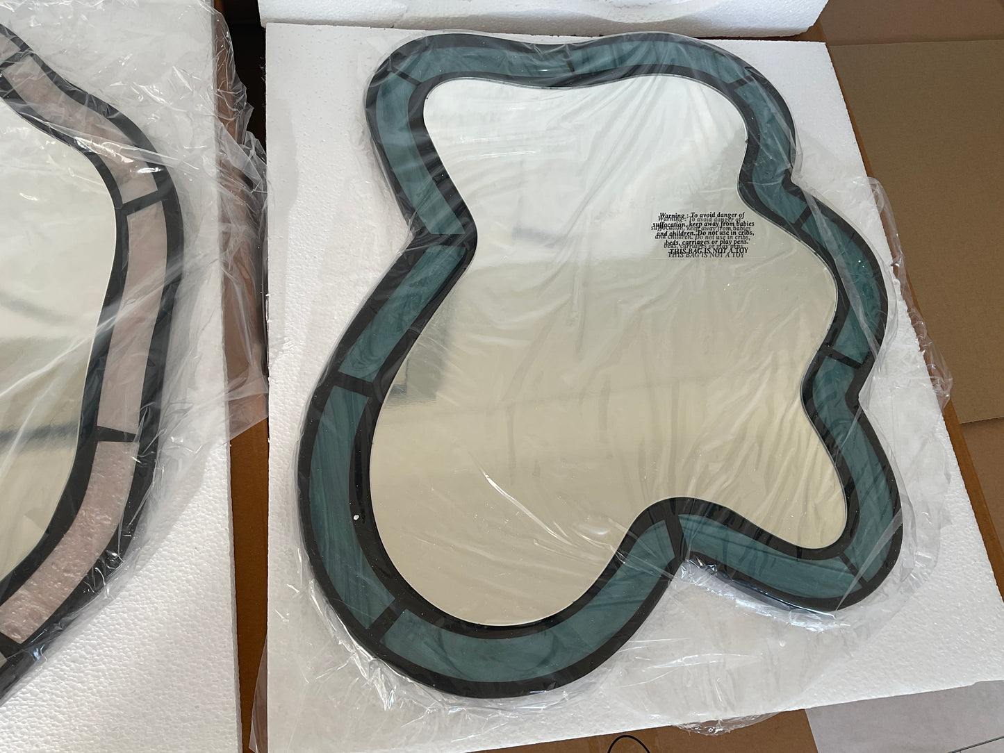 Urban outfitters squiggle pair of mirror in pearlescent blue and lilac RRP £90