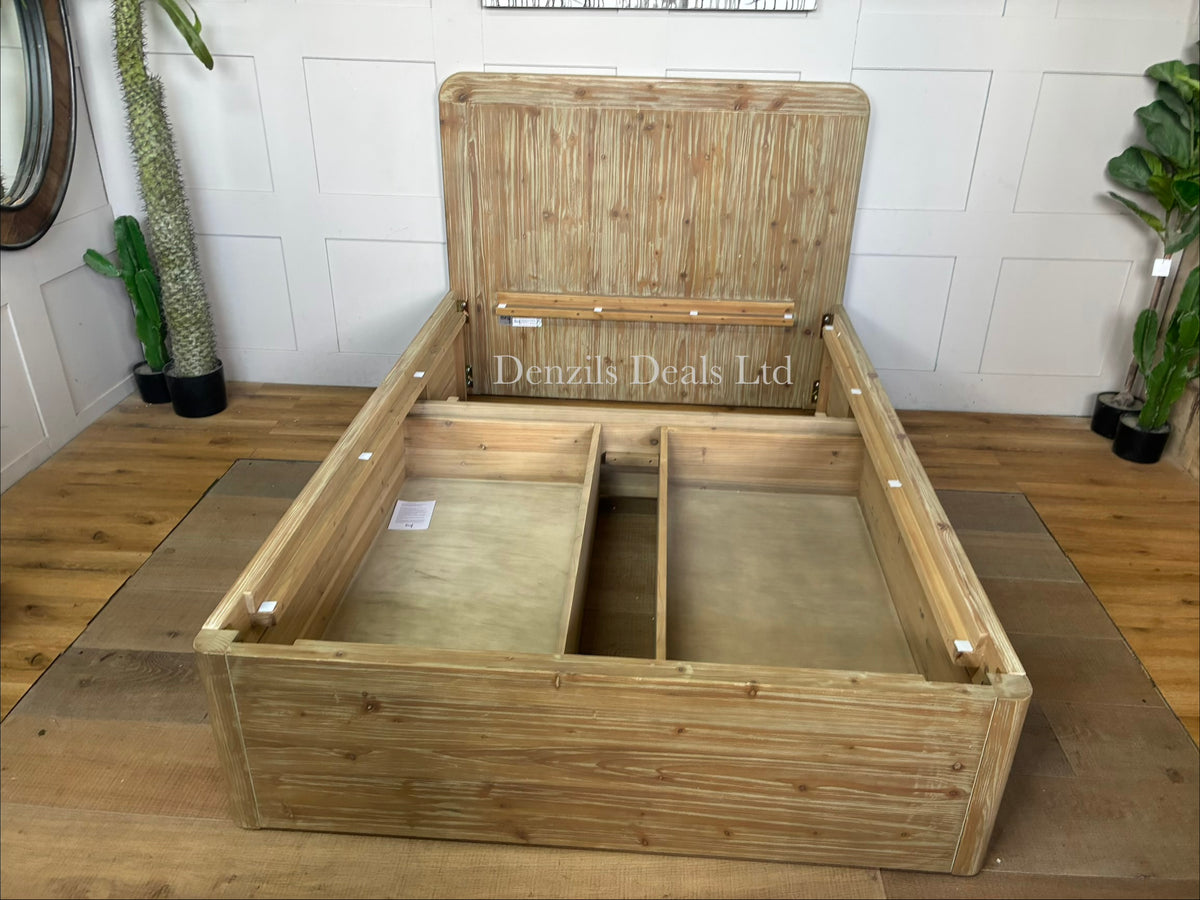 A Loaf Woody double bed frame handcrafted from textured, reclaimed solid fir wood. The rustic, natural wood frame features a raw-looking headboard with exposed grain variations, minimalist clean lines, and integrated under-bed storage space No slats