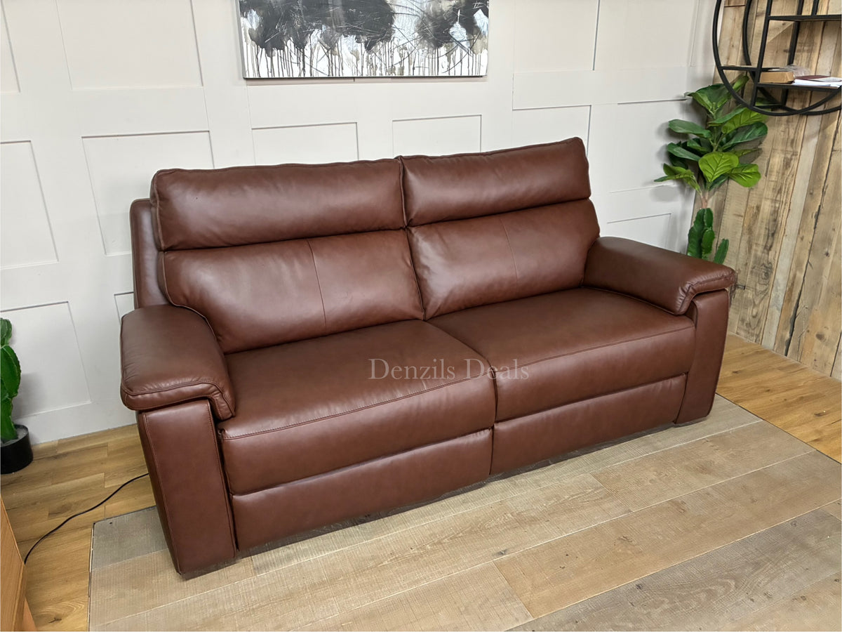 A classic three-seater electric recliner sofa upholstered in smooth, rich Virgo Chestnut brown leather.