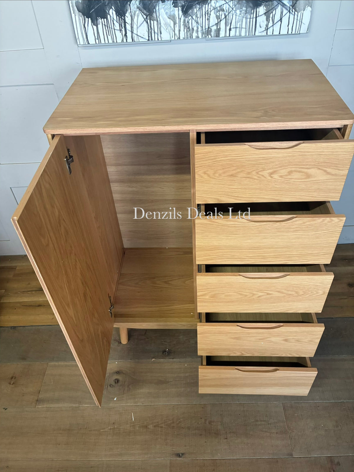 A compact natural solid oak and veneer low wardrobe from the John Lewis Bow range, featuring five integrated drawers, soft rounded edges, and splayed legs