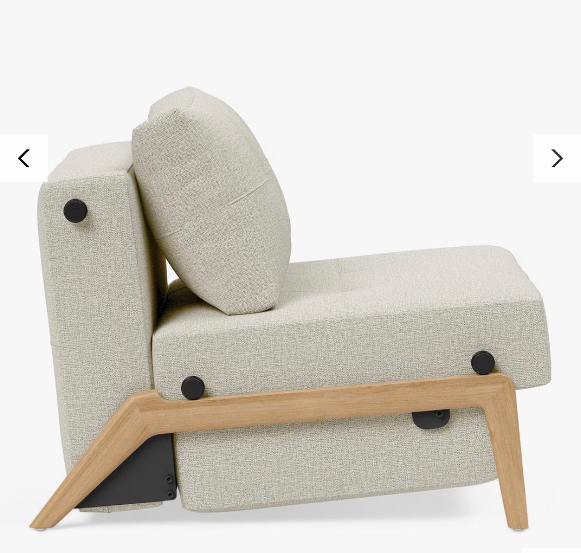 A contemporary Scandinavian-style Innovation Living Cubed 90 convertible armchair upholstered in Mixed Dance Natural fabric—a light beige, textured melange weave. It features a compact, minimalist square profile with clean lines and light oak wooden legs.