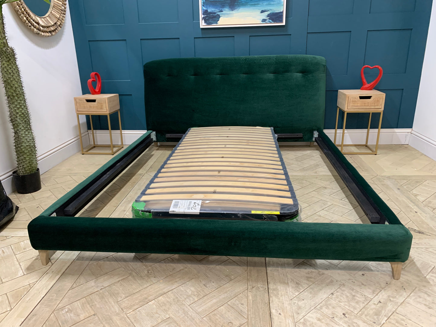 LOAF Superking Slumbleton Bed in Christmas Tree Clever Velvet. A deep green velvet superking bed frame with a raked, upholstered headboard.