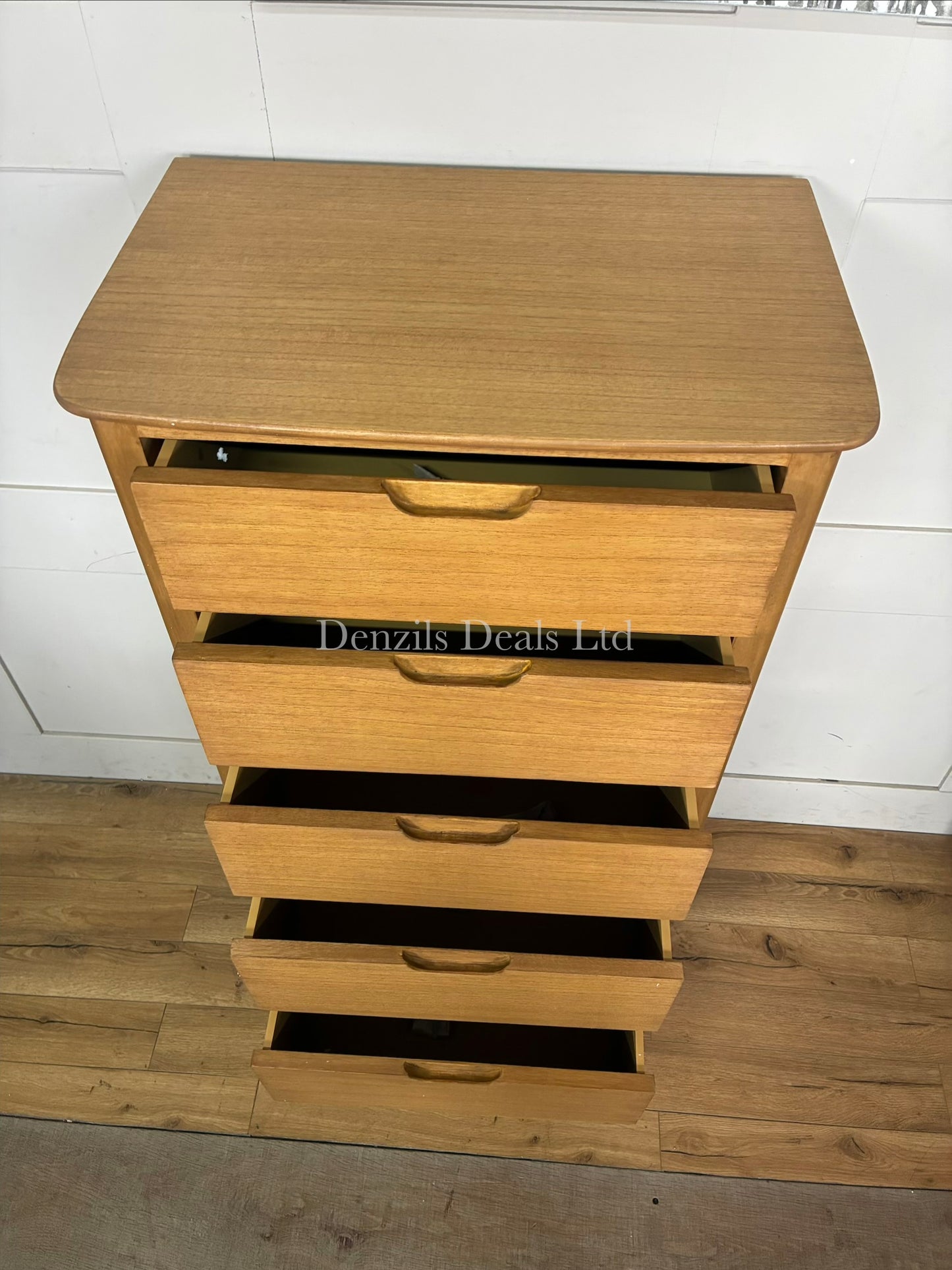 A front view of the Fishie & Lilly Norway solid oak 5-drawer chest of drawers against a white background.