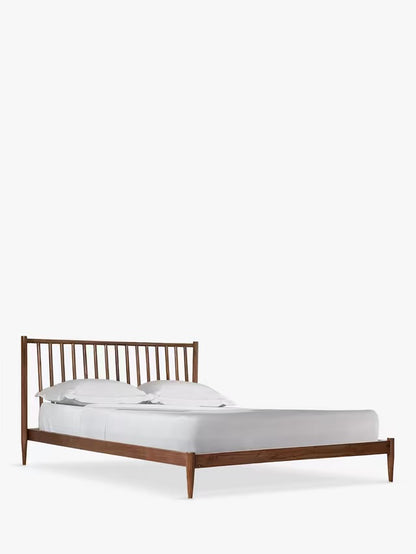 A king-size wooden bed frame made from dark brown acacia wood, featuring a modern vertical-slatted spoked headboard."