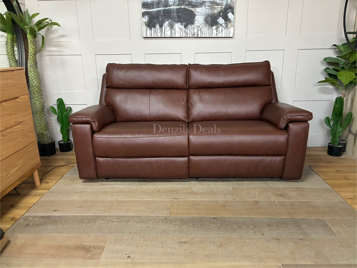 A modern 3-seater electric recliner sofa upholstered in smooth, rich chestnut brown leather from the Selby range, featuring sleek lines, wide armrests, and contrasting stitch details along the back and seat cushions