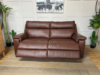 A modern living room featuring the Selby 3-seater power recliner sofa in Chestnut brown leather, styled alongside traditional oak furniture and warm lighting