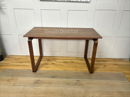 A smooth, spacious rectangular desktop with soft, rounded corners and exposed finger-joint details at the corners, highlighting its traditional cabinet-maker craftsmanship
