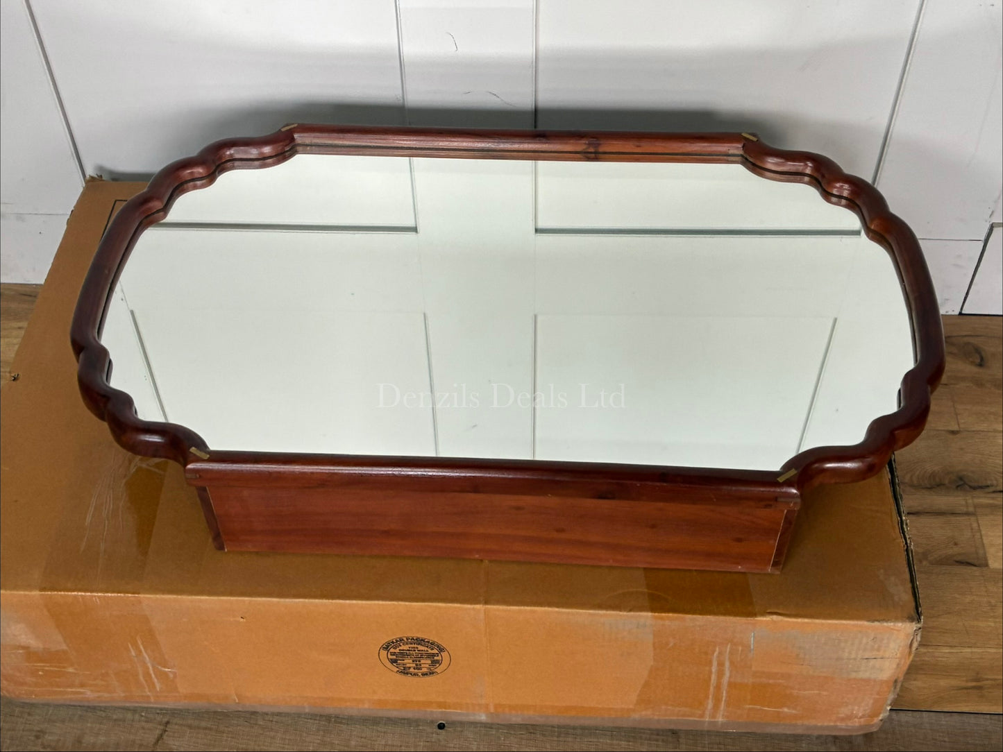 Alia Bath Cabinet Mirror by Anthropologie in a scalloped acacia wood frame