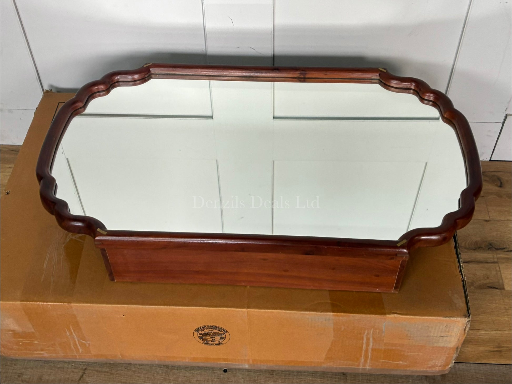 Alia Bath Cabinet Mirror by Anthropologie in a scalloped acacia wood frame
