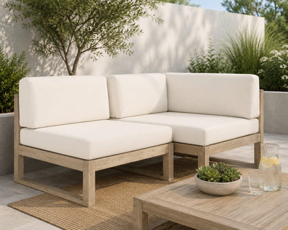 An outdoor corner and modular chairs from the John Lewis St Ives collection, crafted from FSC-certified eucalyptus wood with a slatted back, paired with plush, water-resistant seat and back cushions