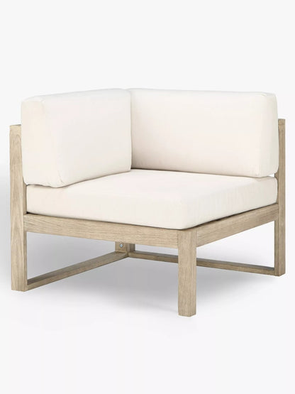 An outdoor corner and modular chairs from the John Lewis St Ives collection, crafted from FSC-certified eucalyptus wood with a slatted back, paired with plush, water-resistant seat and back cushions