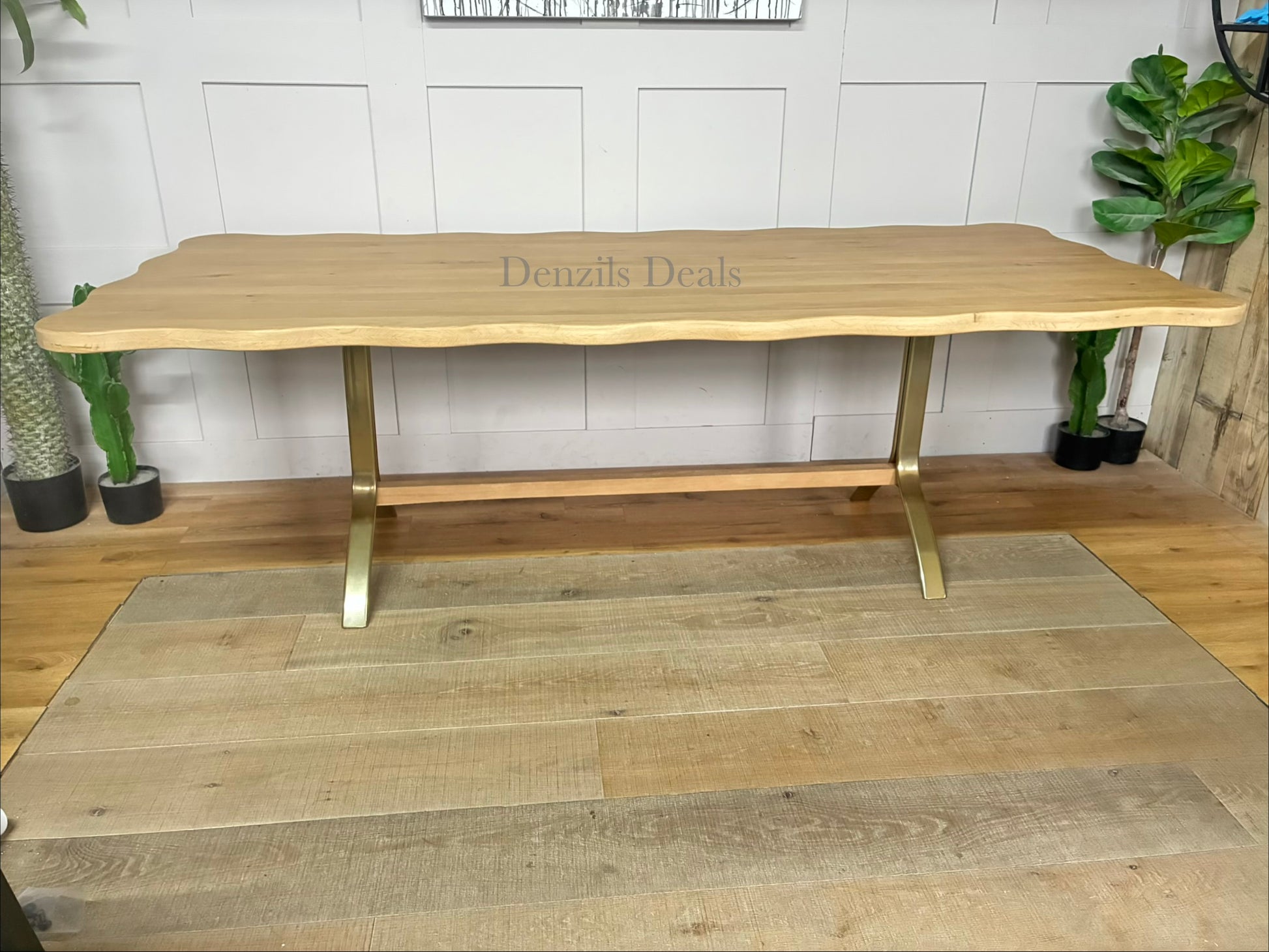 Anthropologie Caldwell Rectangular Oak Dining Table in a natural wood finish With alternative legs