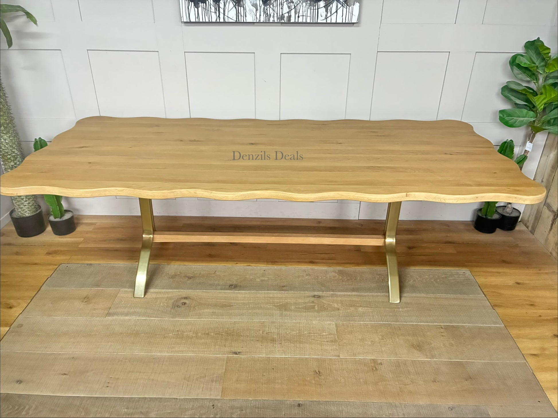 Anthropologie Caldwell Rectangular Oak Dining Table in a natural wood finish With alternative legs