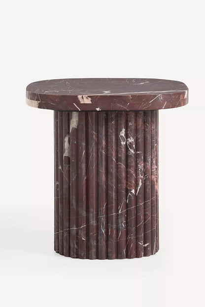 Anthropologie Kanta square 18-inch side table made of rich Merlot-coloured marble with a heavily veined, smooth square top and a chunky, cylindrical fluted pedestal base