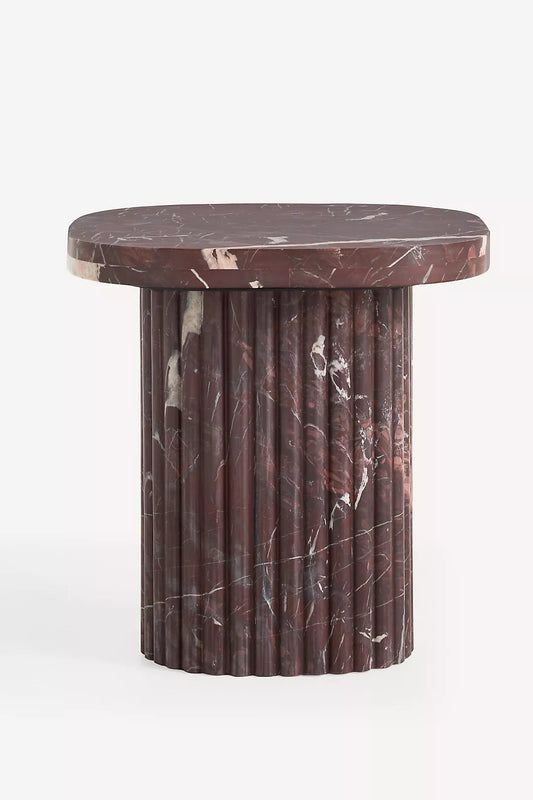 Anthropologie Kanta square 18-inch side table made of rich Merlot-coloured marble with a heavily veined, smooth square top and a chunky, cylindrical fluted pedestal base