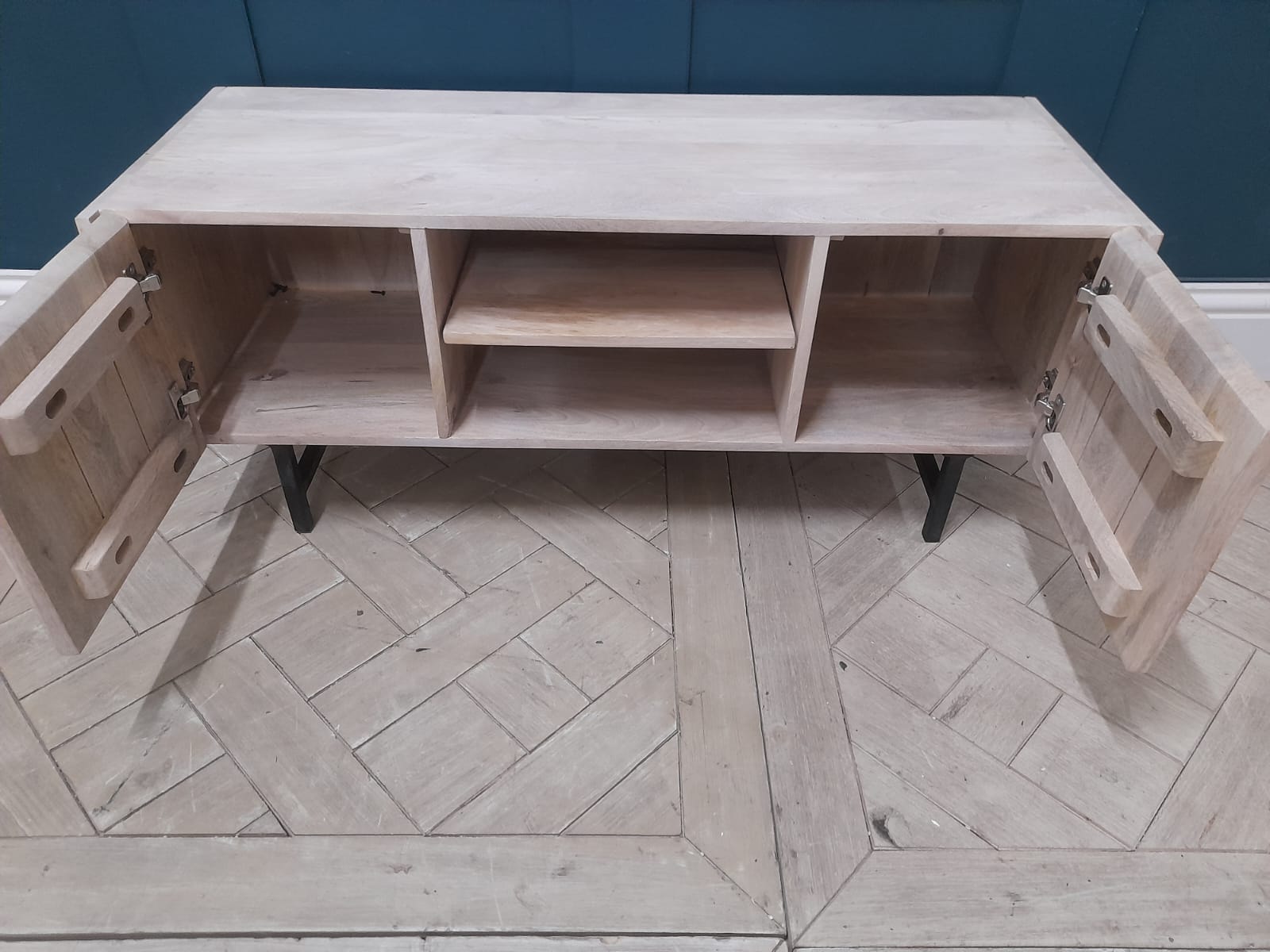 Aphra TV Stand, Light Mango Wood and Black, 108cm Wide.Powder coated metal legs