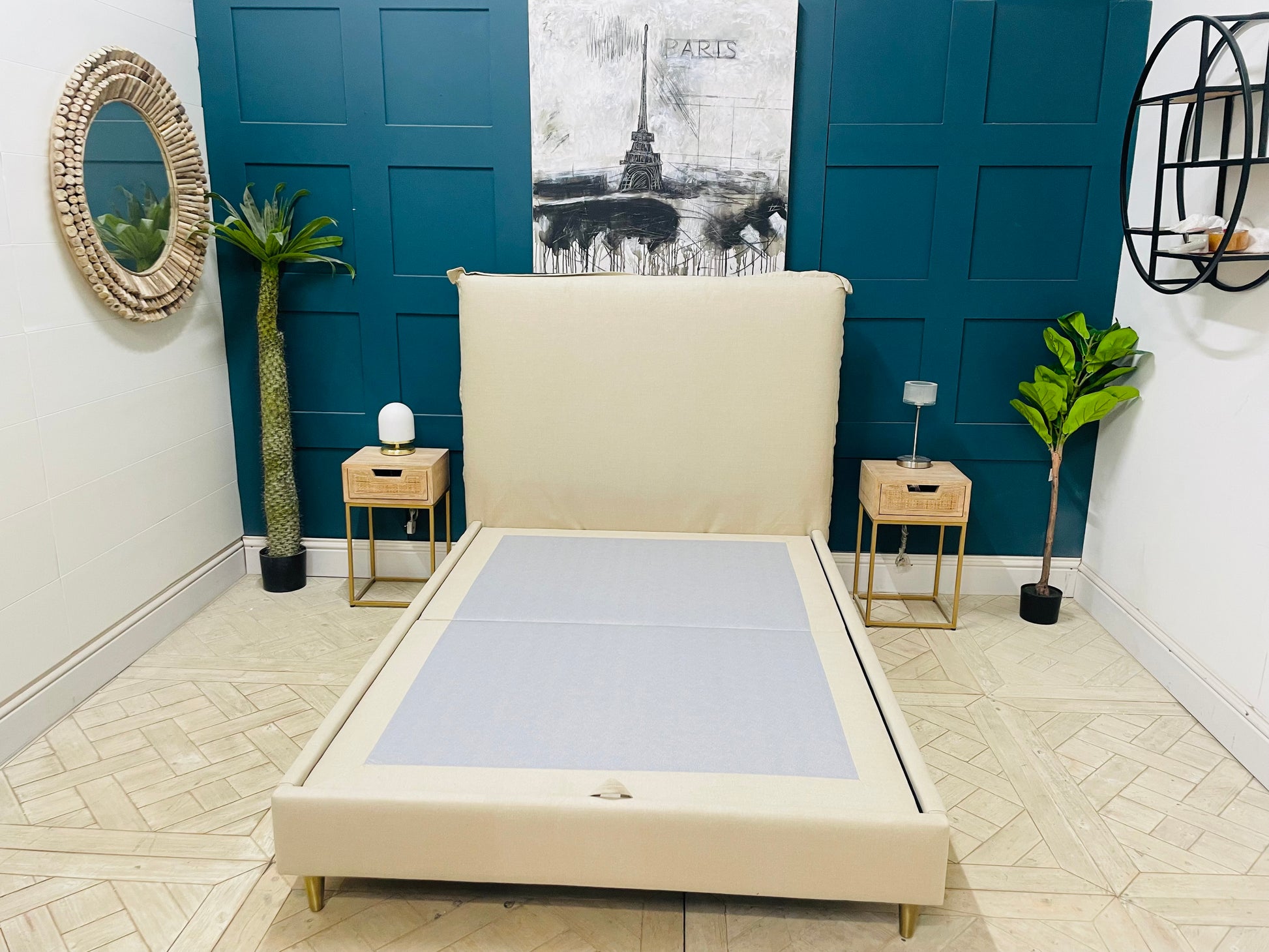 Gallery Direct Appledore double bed frame in a light grey upholstered fabric, featuring a minimalist rectangular headboard with external seam detailing and four tapered light-wood legs."