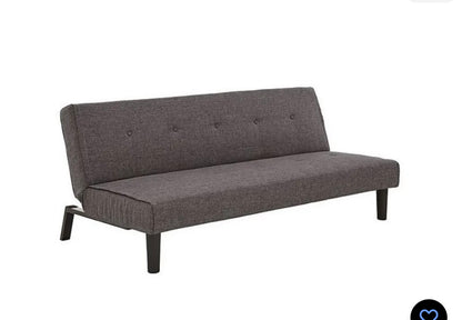 Blue Dax fabric sofa bed with linen-effect upholstery, tufted back, and dark legs in a modern living room setting.