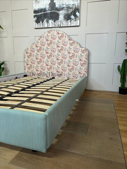 Cath Kidston Flounce double bed frame in Strawberry Garden fabric, exclusively from DFS. A handcrafted upholstered bed with a statement cloud-curved headboard