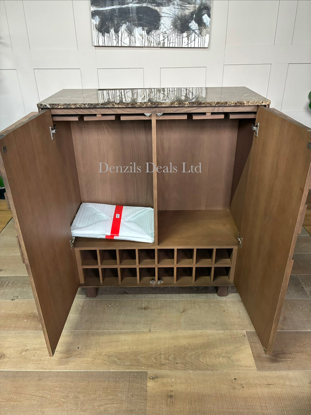 Close-up of the John Lewis Check Marble Top Drinks Cabinet in dark brown oak, showcasing its detailed check-patterned woodwork and rich Emperador marble top