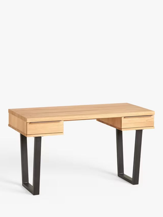 Compact home office desk made from solid oak with a wire-brushed, distressed finish. It features two sliding drawers with slim iron handles and sits on a minimalist, square-shaped black iron frame
