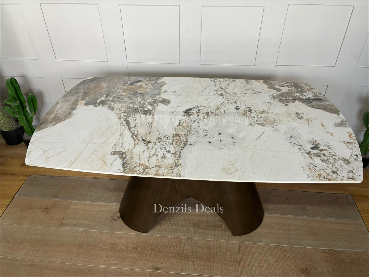 Contemporary oval extending dining table featuring a Pandora marble-style ceramic top and a sculptural matte bronze metal pedestal base