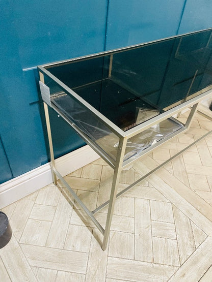 Contemporary silver metal and glass study desk with two shelves"