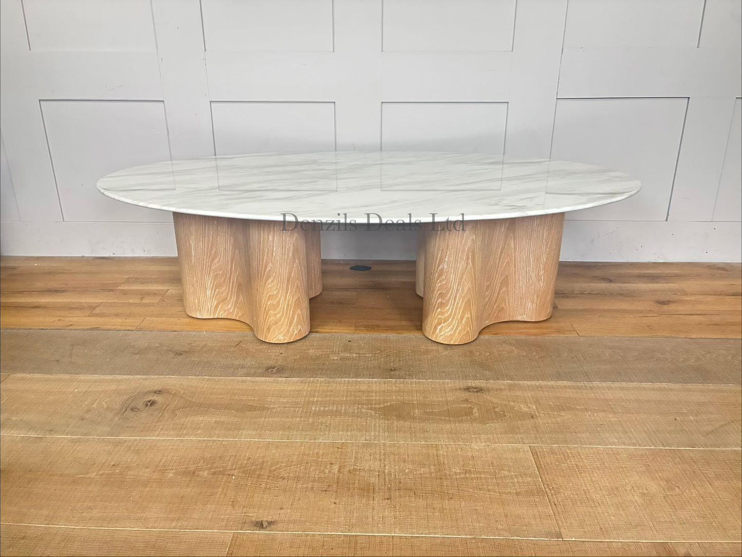 Custom Parc Oval Coffee Table by Nick Scali featuring its signature jazz film marble top and sleek, modern alternative legs."
