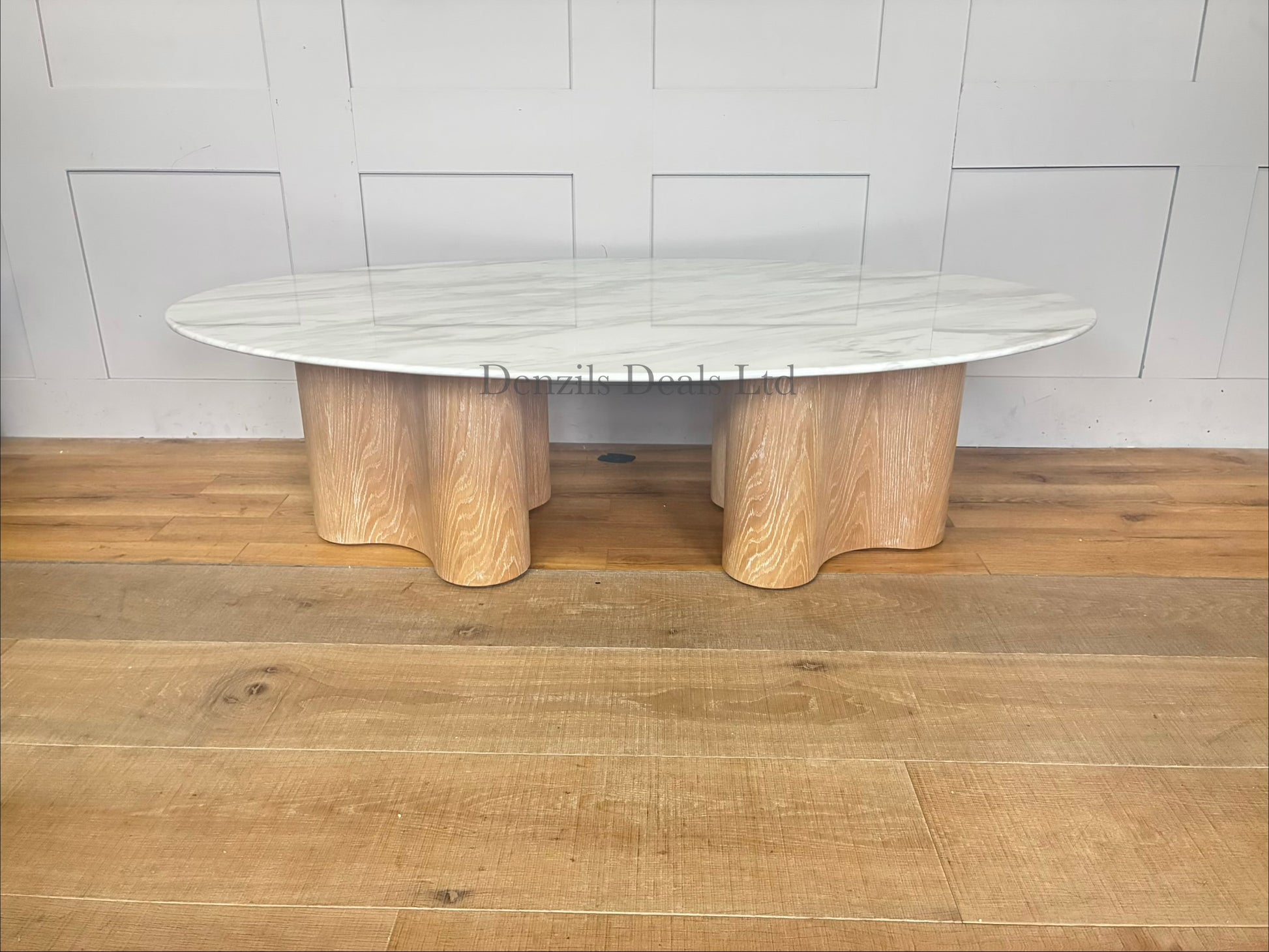 Custom Parc Oval Coffee Table by Nick Scali featuring its signature jazz film marble top and sleek, modern alternative legs."