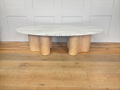 Custom Parc Oval Coffee Table by Nick Scali featuring its signature jazz film marble top and sleek, modern alternative legs."