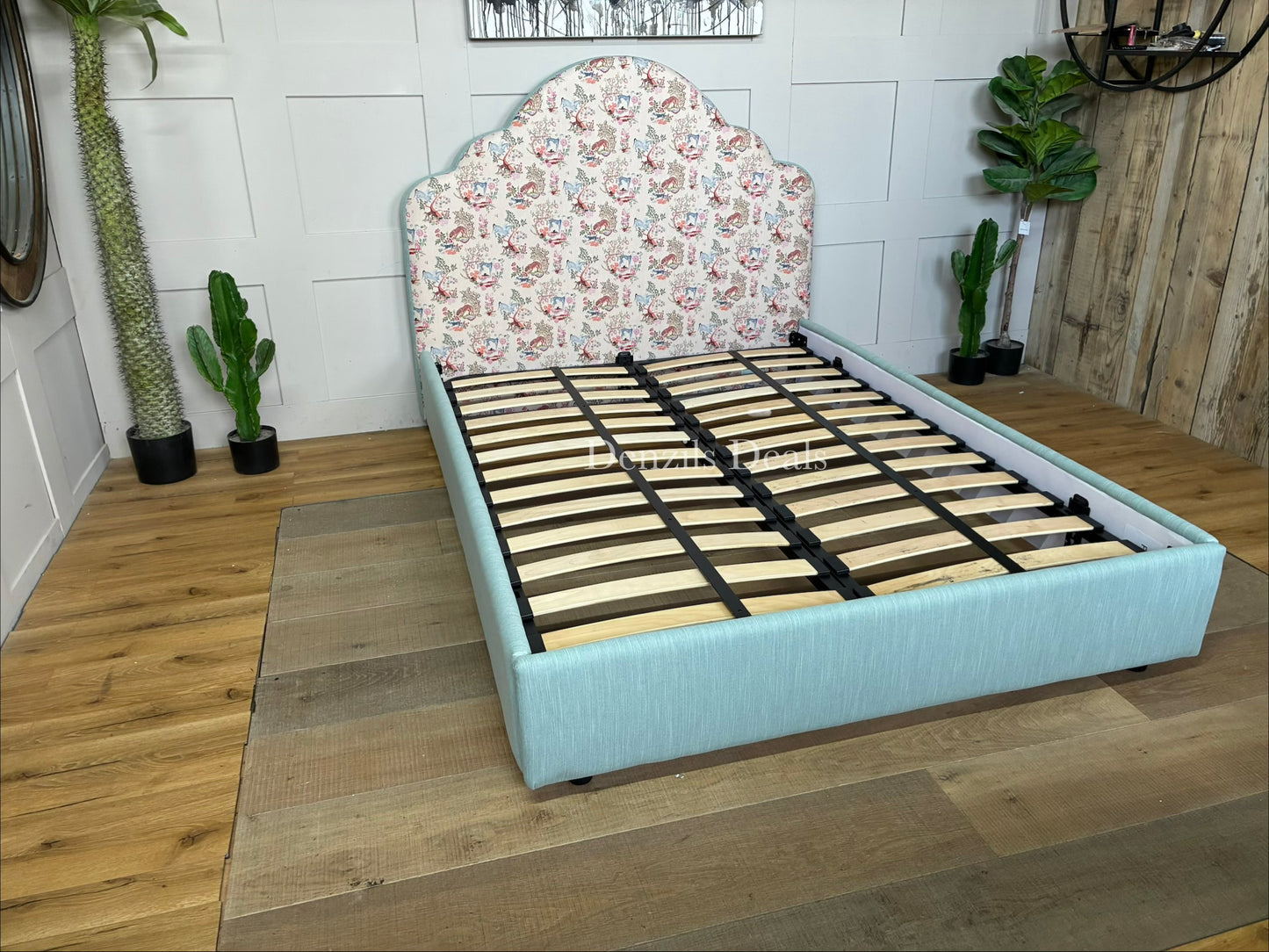 DFS x Cath Kidston Flounce double bed frame featuring a cloud-shaped headboard, upholstered in the blue Azure Strawberry Garden floral print