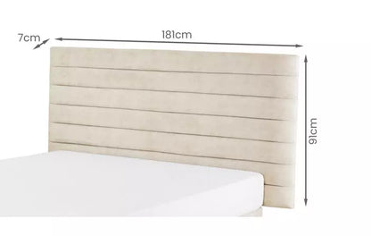 A wall-mounted DFS Karina rectangular headboard panel measuring 90x180cm, upholstered in Gaia Cream plush recycled velvet with vertical channel stitching.