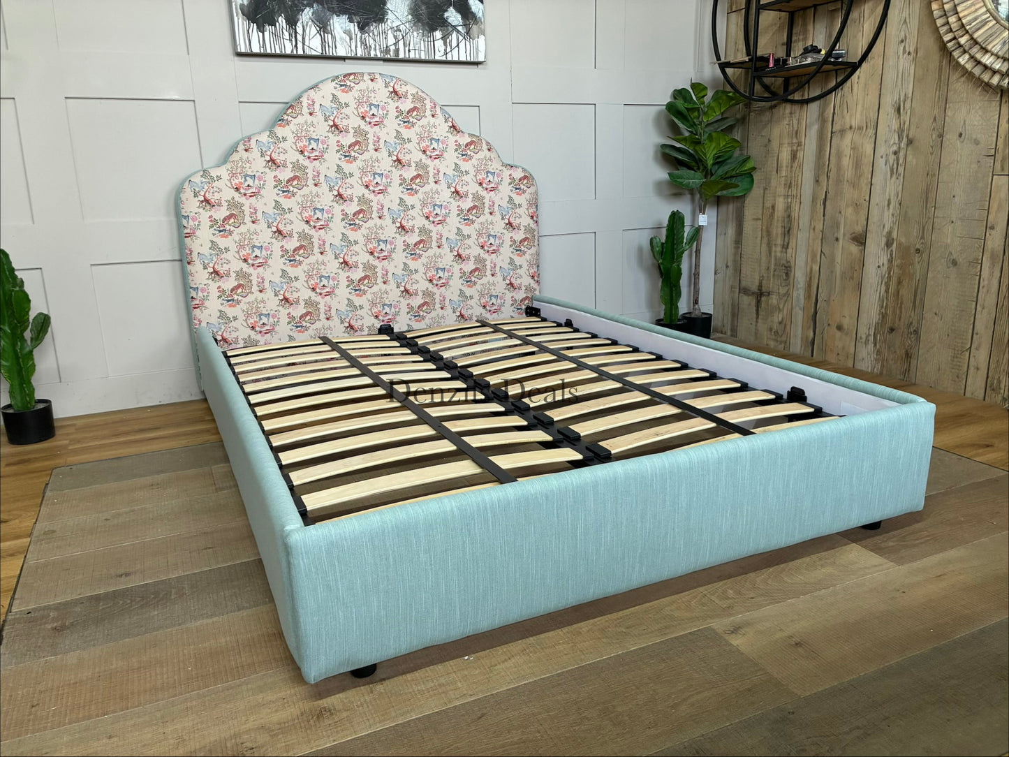 DFS x Cath Kidston Flounce double bed frame featuring a cloud-shaped headboard, upholstered in the blue Azure Strawberry Garden floral print