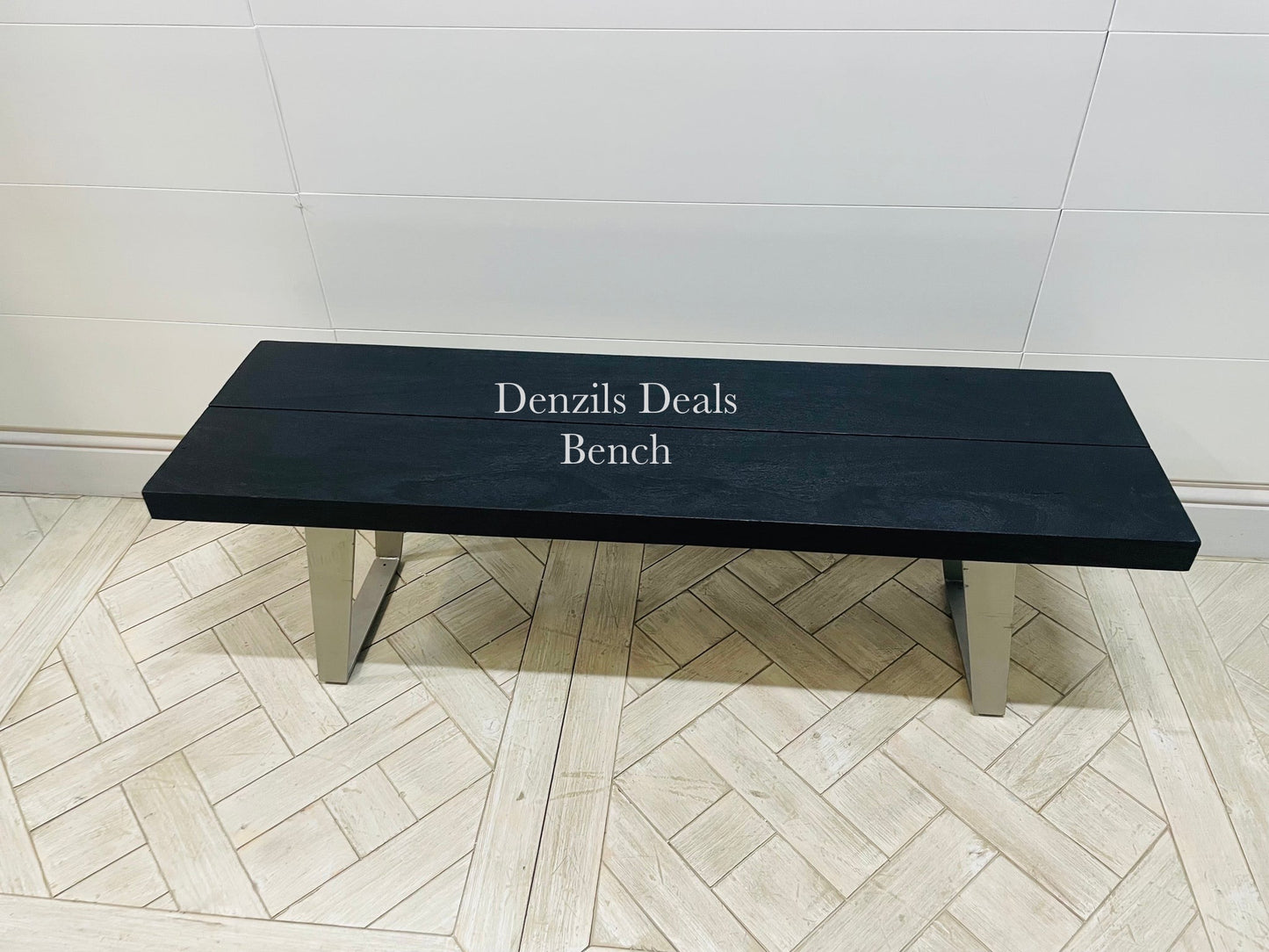 Newington Black Dining Table (180cm) & Bench, Small By Gallary Direct
Solid black acacia wood top
Angular metal legs
Seat 4 - 6 people

