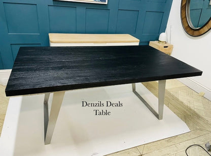 Newington Black Dining Table (180cm) & Bench, Small By Gallary Direct
Solid black acacia wood top
Angular metal legs
Seat 4 - 6 people
