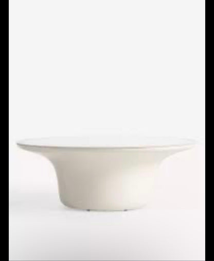 A Dulce 42” white pedestal table or display stand with a wide circular top and a flared base, shown against a plain white background.