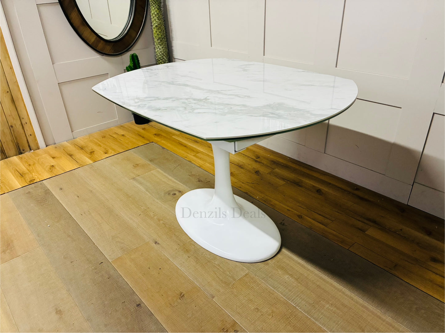 Dwell Lille white ceramic dining table with marble effect top and white tulip-style pedestal base, extended to seat 6