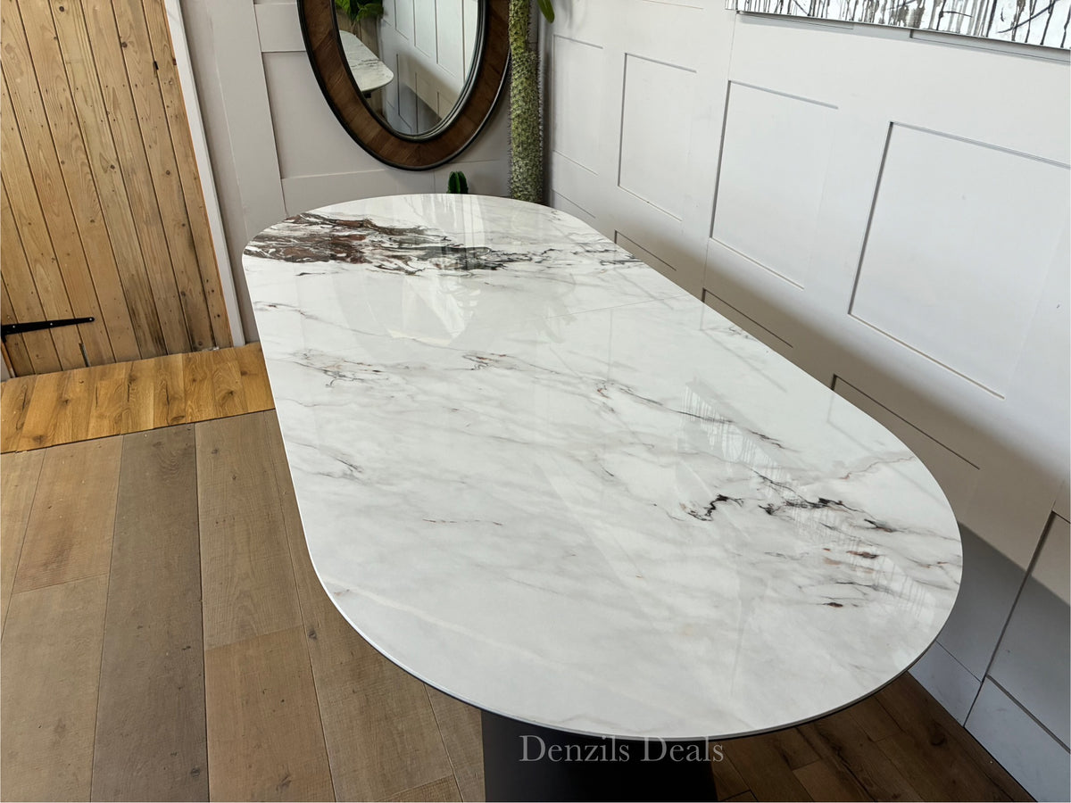 Dwell Lorea extending dining table with a white marble-effect ceramic top and grey sloping legs