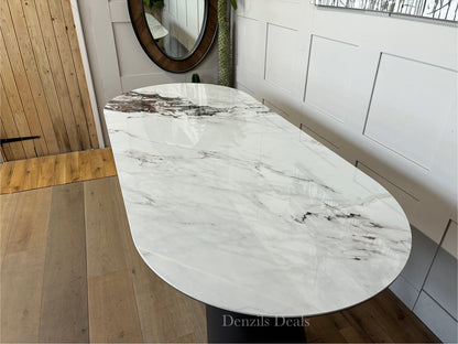 Dwell Lorea extending dining table with a white marble-effect ceramic top and grey sloping legs