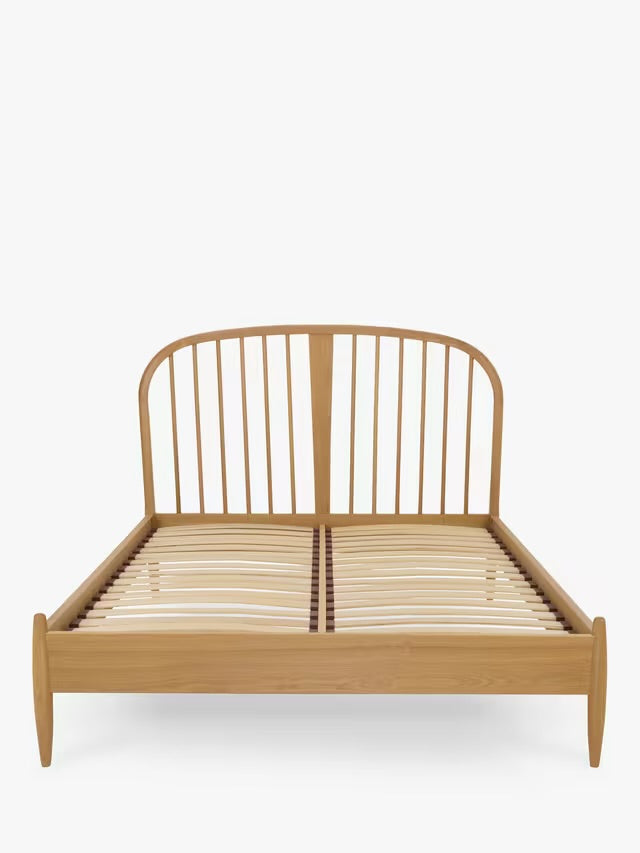 Ercol for John Lewis Hambledon double bed frame, crafted from solid oak with a warm grain, featuring a tall curved, spoked headboard and pre-sprung wooden slatted base