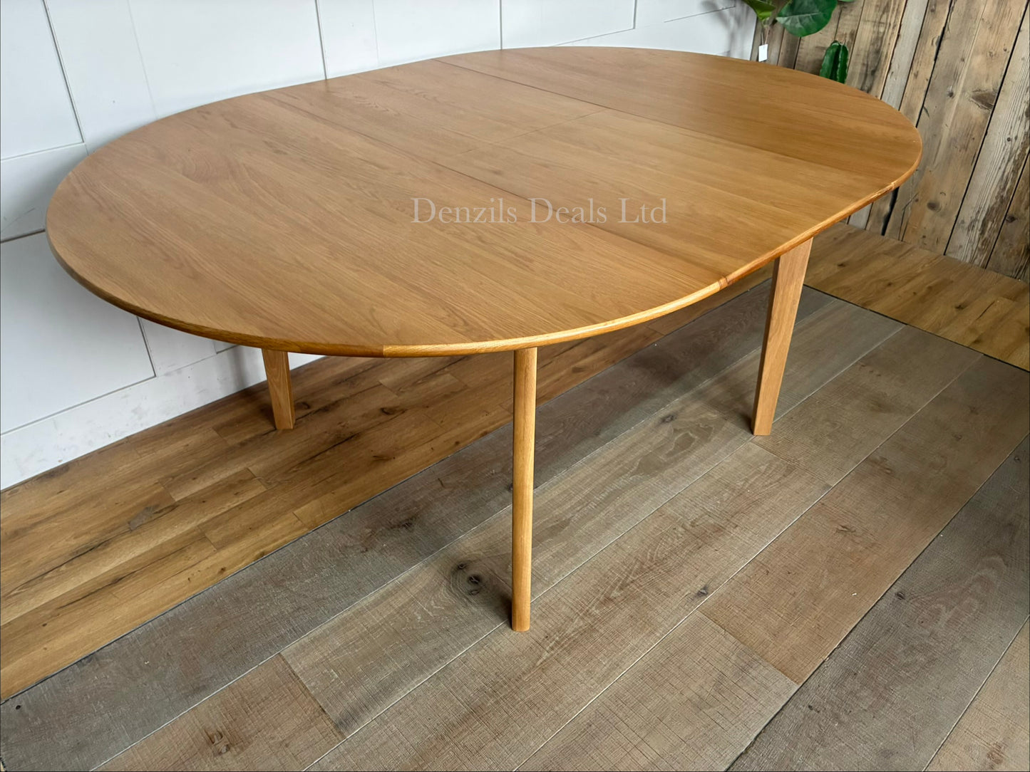 Fishe and Lilly Wright round extendable dining table made from solid light oak wood