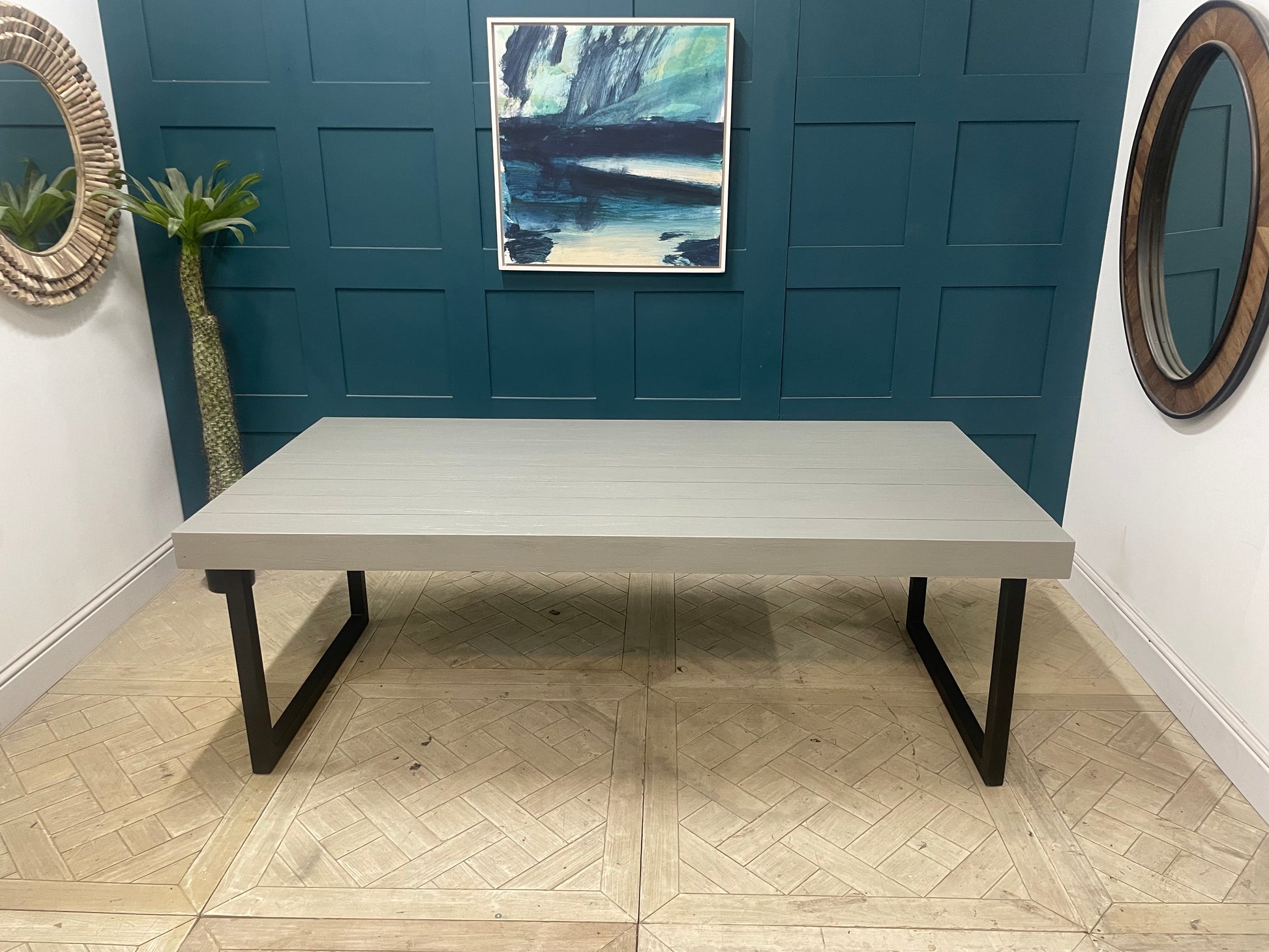 Gallery Direct Frame 8-seater rectangular outdoor dining table in cement grey, featuring a modern minimalistic aesthetic with a smooth tabletop and robust, weather-resistant finish, perfect for contemporary garden spaces."