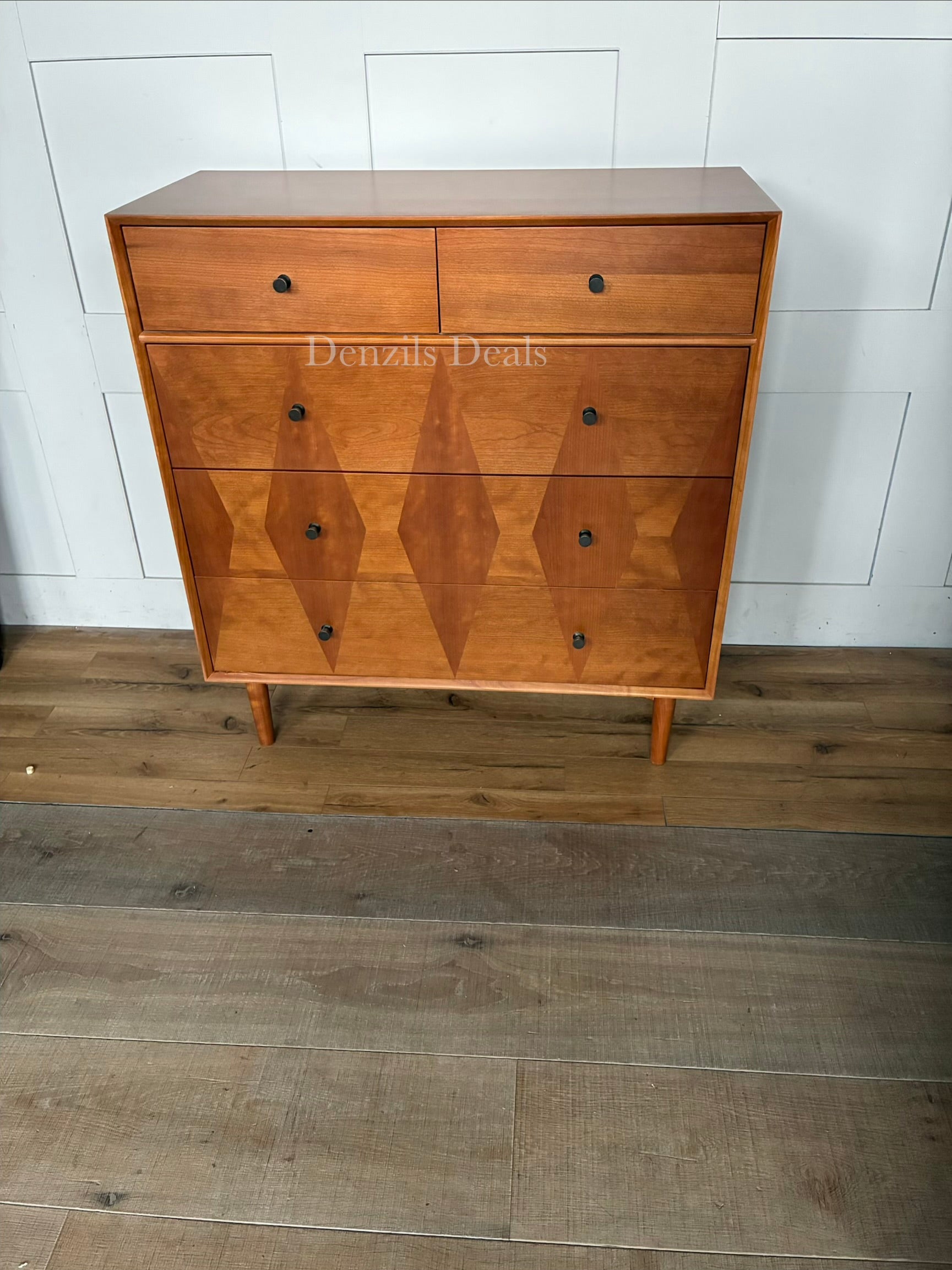 Front view of the John Lewis Marquetry 5-drawer dresser in natural wood, showcasing natural woodgrain contrast and sleek lines