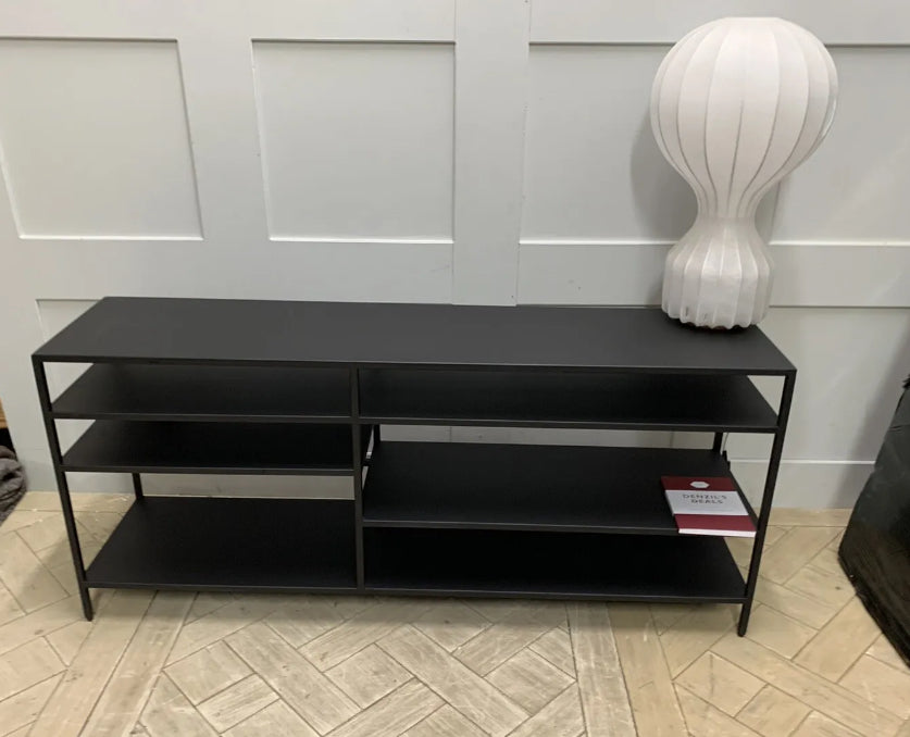 Front view of the Made.com Munro TV stand, showing its slim metallic frame in a warm brass finish with multiple levels of open shelving, ideal for a contemporary or industrial living room setup
