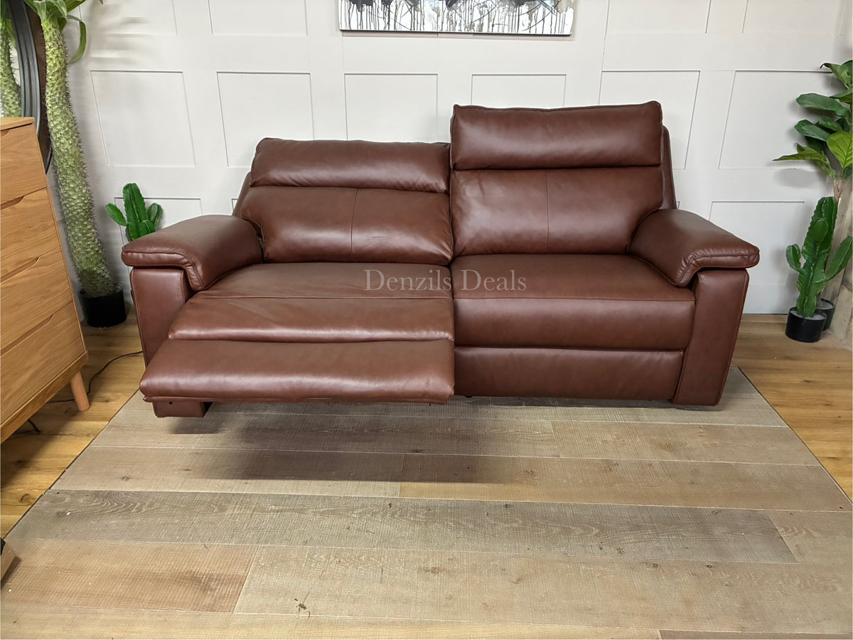 Front view of the Selby 3-seater electric recliner sofa from Oak Furnitureland, upholstered in premium Virgo Chestnut brown leather. The sofa features thick cushioned armrests, plush pocket-sprung seats, and a sleek, transitional design that blends classic and contemporary styles.