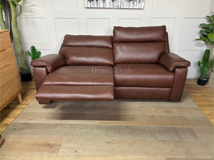 Front view of the Selby 3-seater electric recliner sofa from Oak Furnitureland, upholstered in premium Virgo Chestnut brown leather. The sofa features thick cushioned armrests, plush pocket-sprung seats, and a sleek, transitional design that blends classic and contemporary styles.