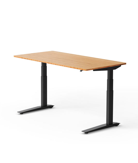 Fully Jarvis 120cm sit/stand desk by Herman Miller featuring a natural wood-grain top and a black motorized metal frame.