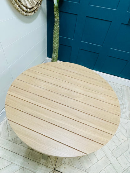 Gallery Direct Eton round dining table, light oak and grey Prairie finish.